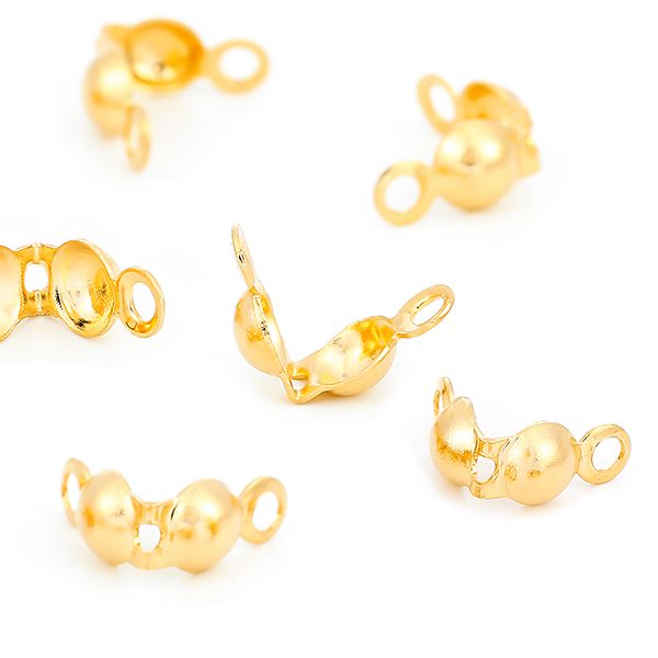 Goldfarbene Perlenspitzen 65 Stk.