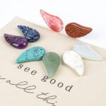 Ala piedras semipreciosas para colgante